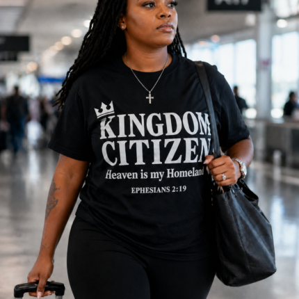 Woman representing her faith wearing a Kingdom Citizen Tee shirt.
